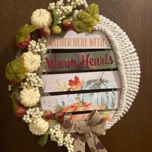 new handcrafted Warm heart pumpkin wreath with rope and pumpkins.